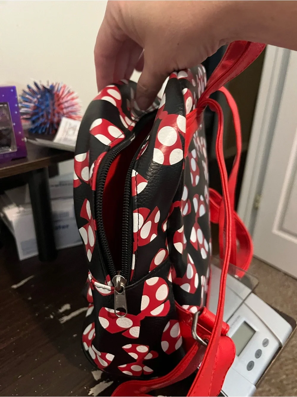 Disney Black Backpack with Red and White Bow Print